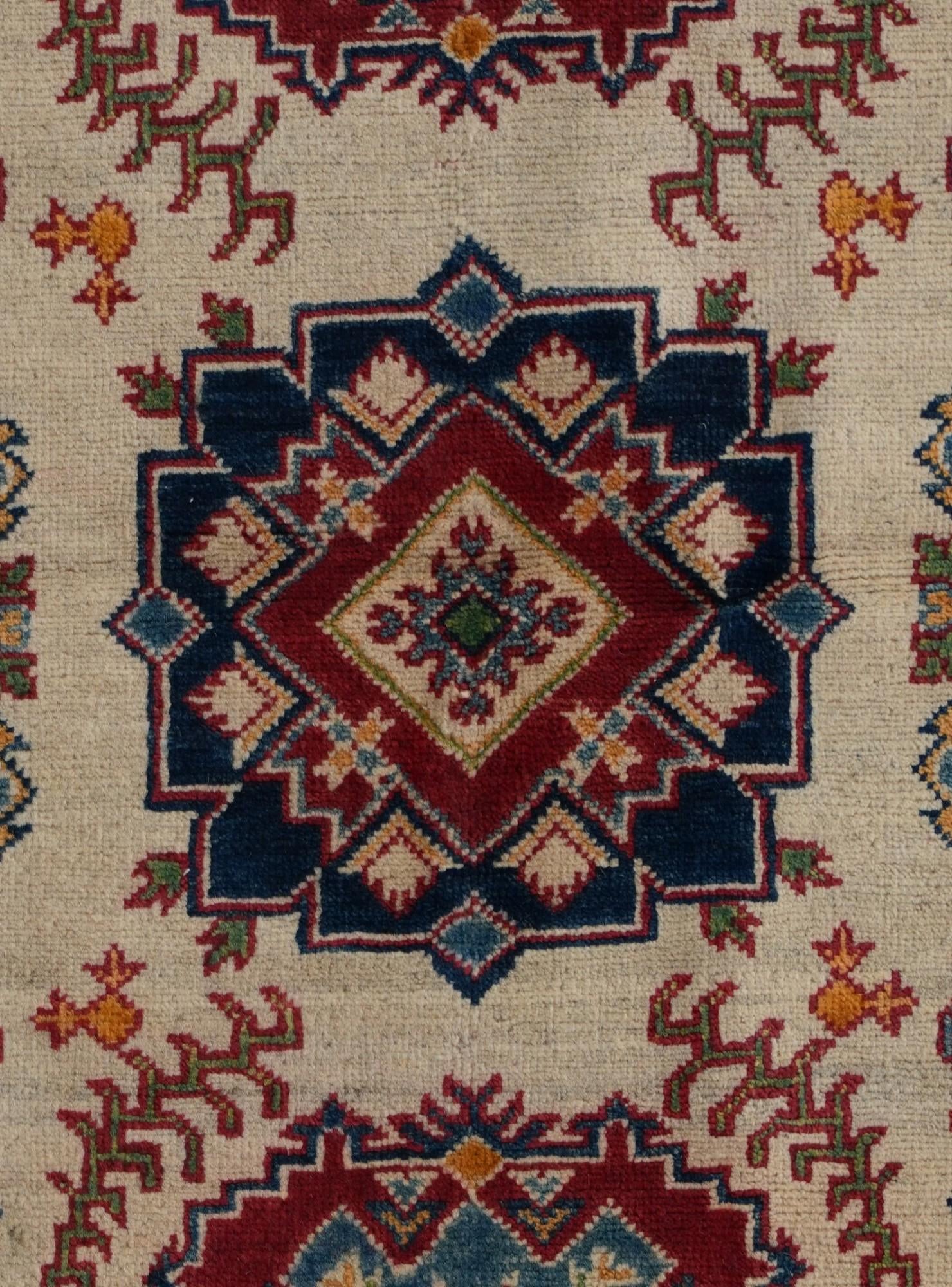 3' 3 x 5' Hand Knotted Kazak Rug