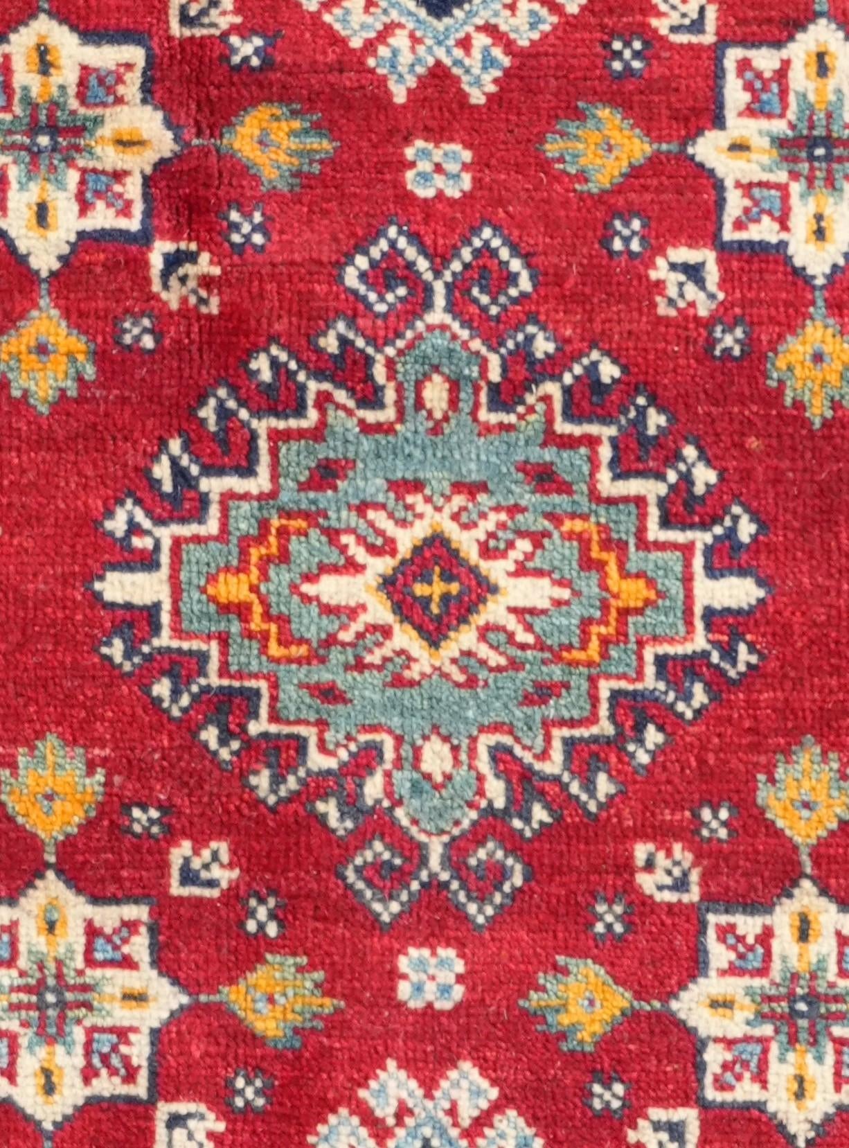 5' 1 x 6' 7 Hand Knotted Kazak Rug