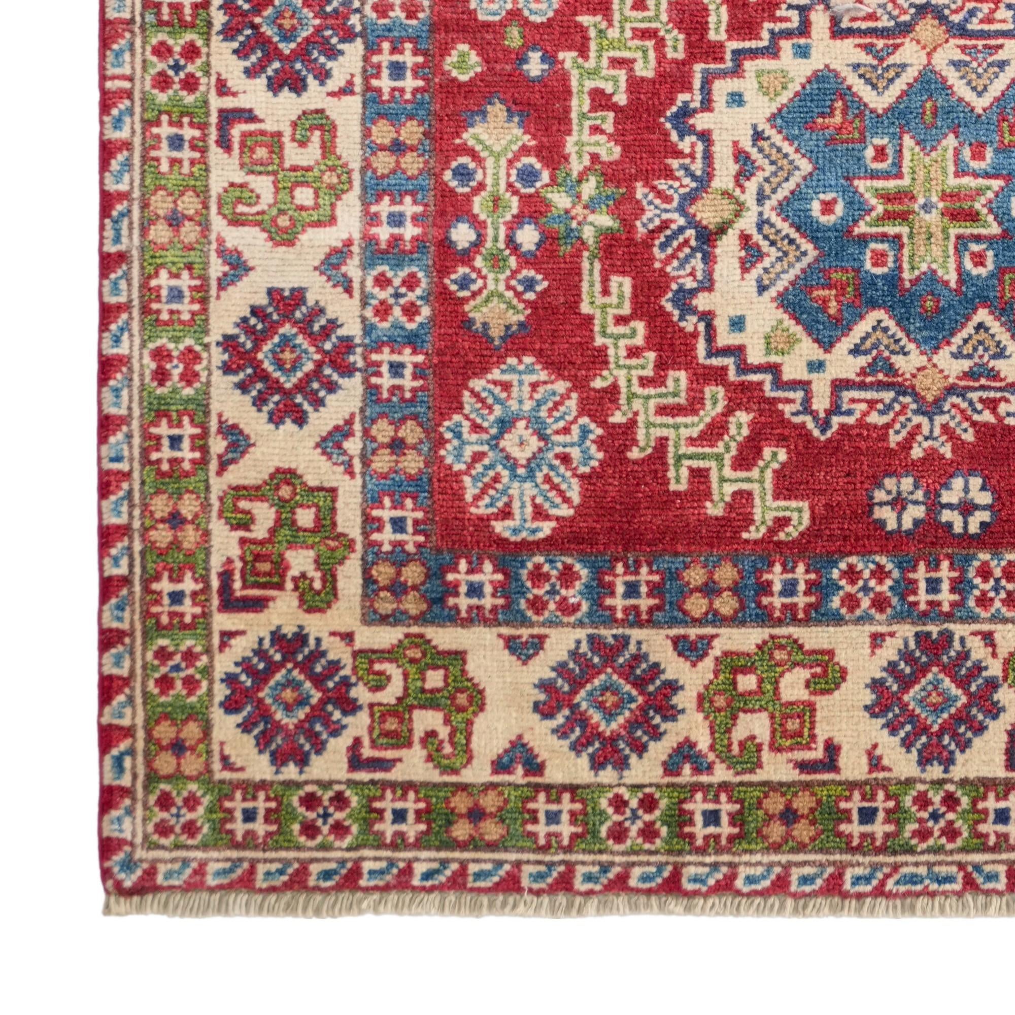 3' 3 x 5' 3 Hand Knotted Kazak Rug