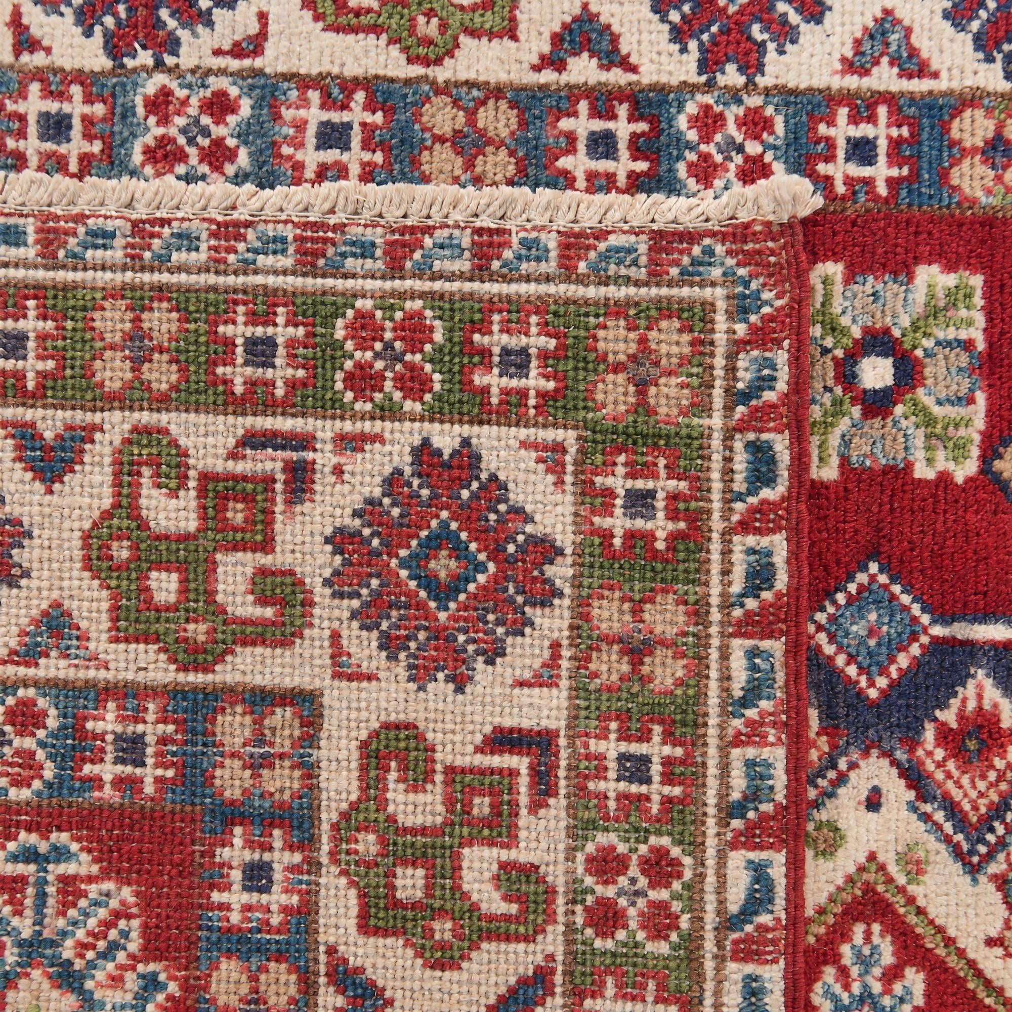 3' 3 x 5' 3 Hand Knotted Kazak Rug