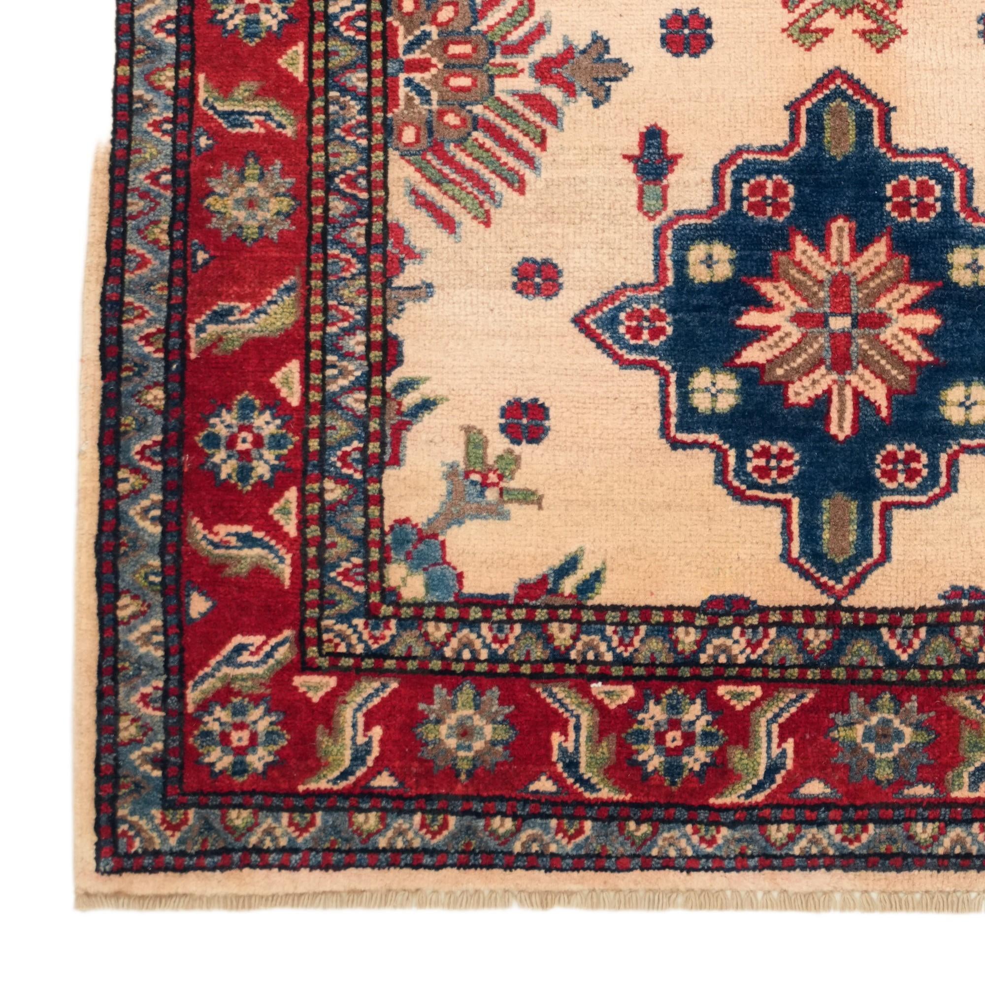 3' 2 x 4' 9 Hand Knotted Kazak Rug