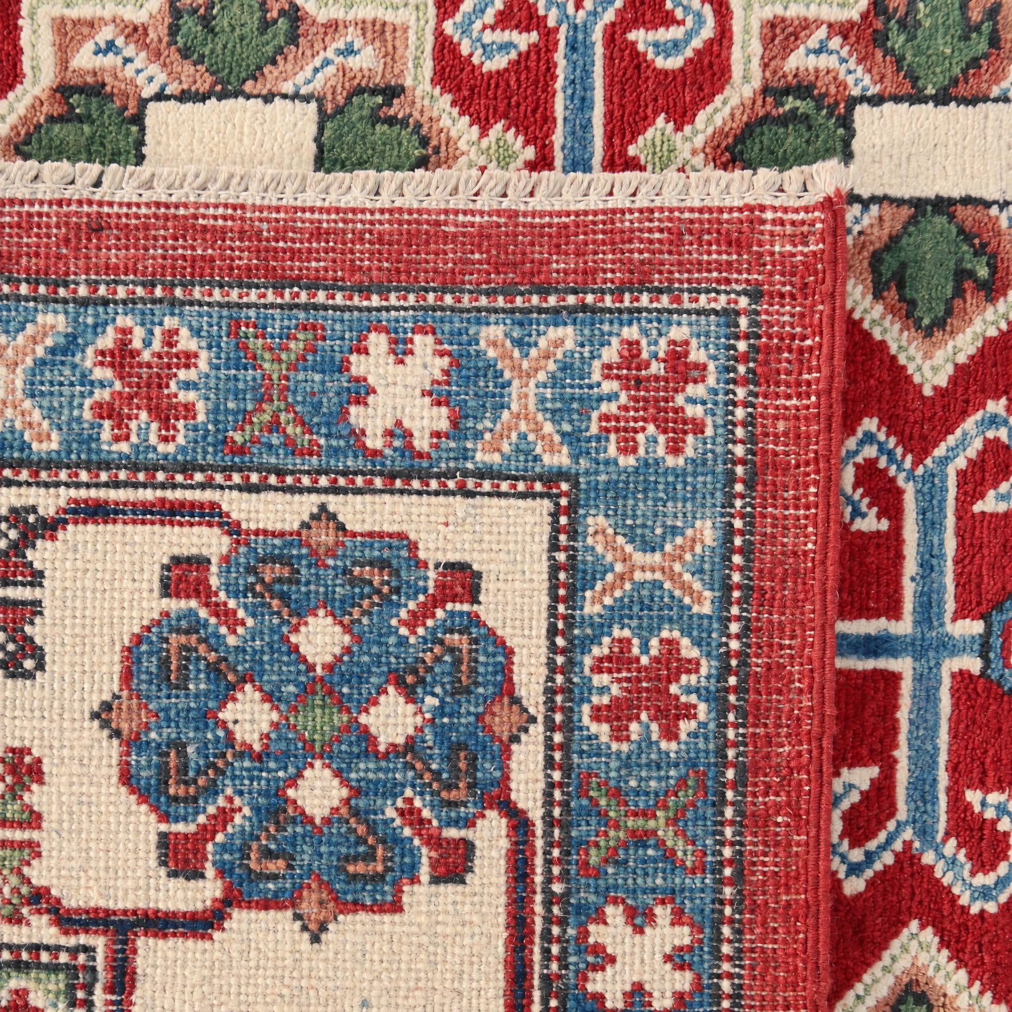 6' x 8' 9 Hand Knotted Kazak Rug