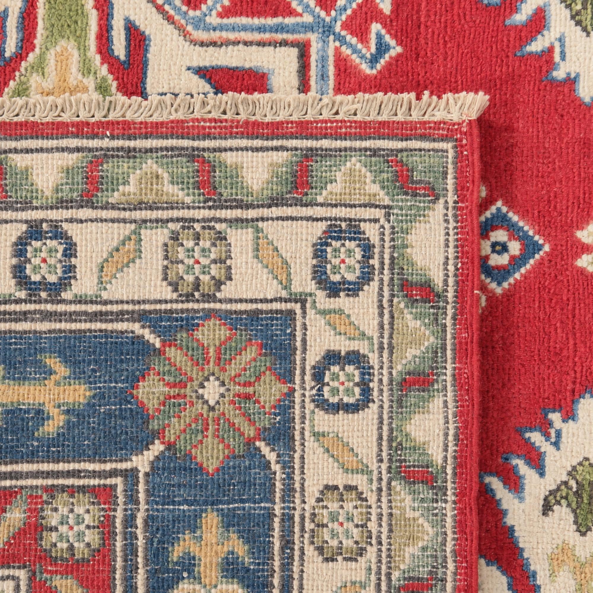 5' 11 x 9' 4 Hand Knotted Kazak Rug