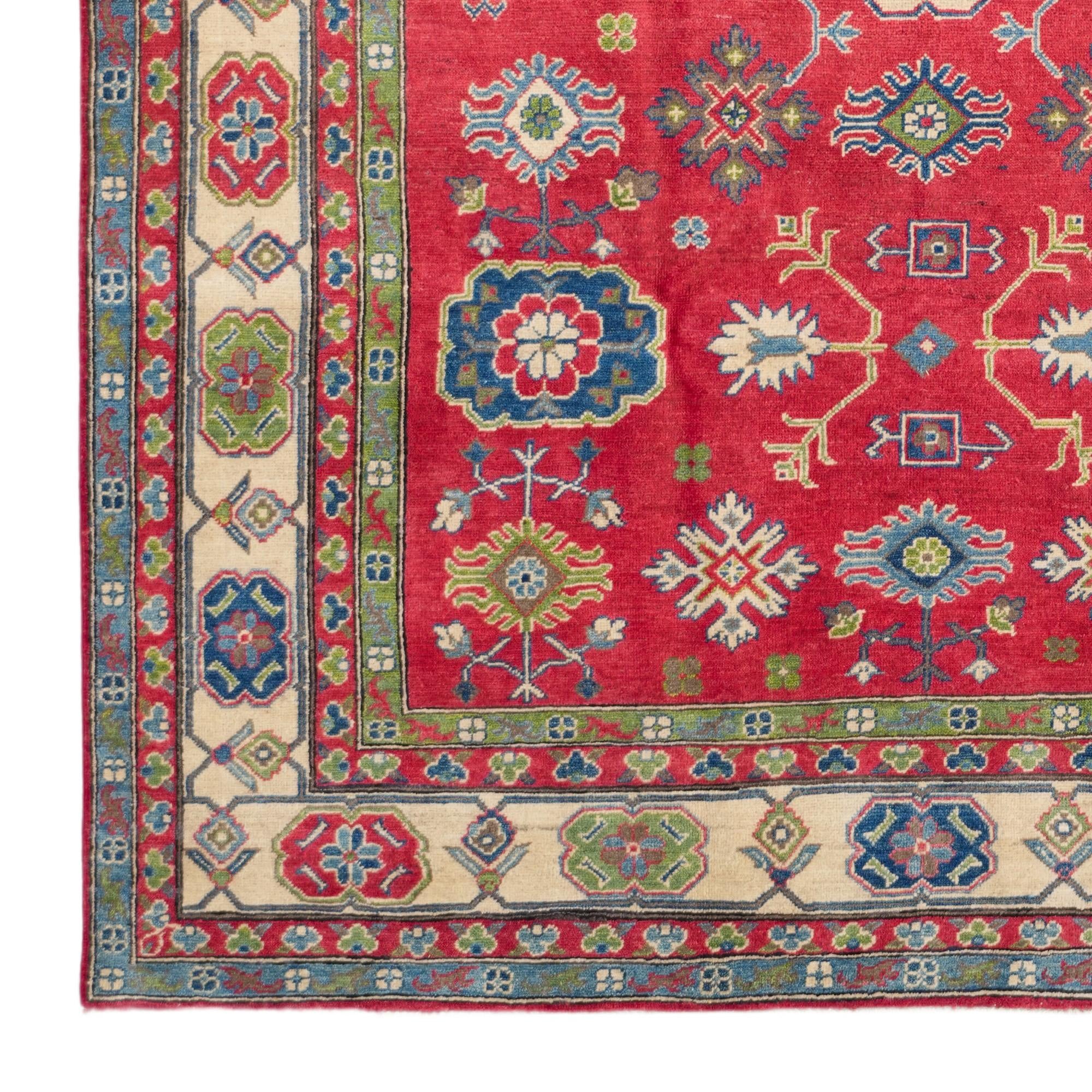 6' 9 x 9' 3 Hand Knotted Kazak Rug