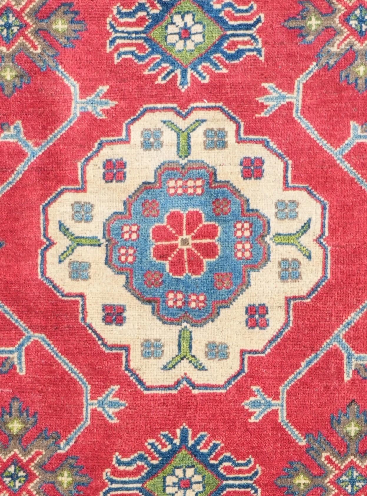 6' 9 x 9' 3 Hand Knotted Kazak Rug