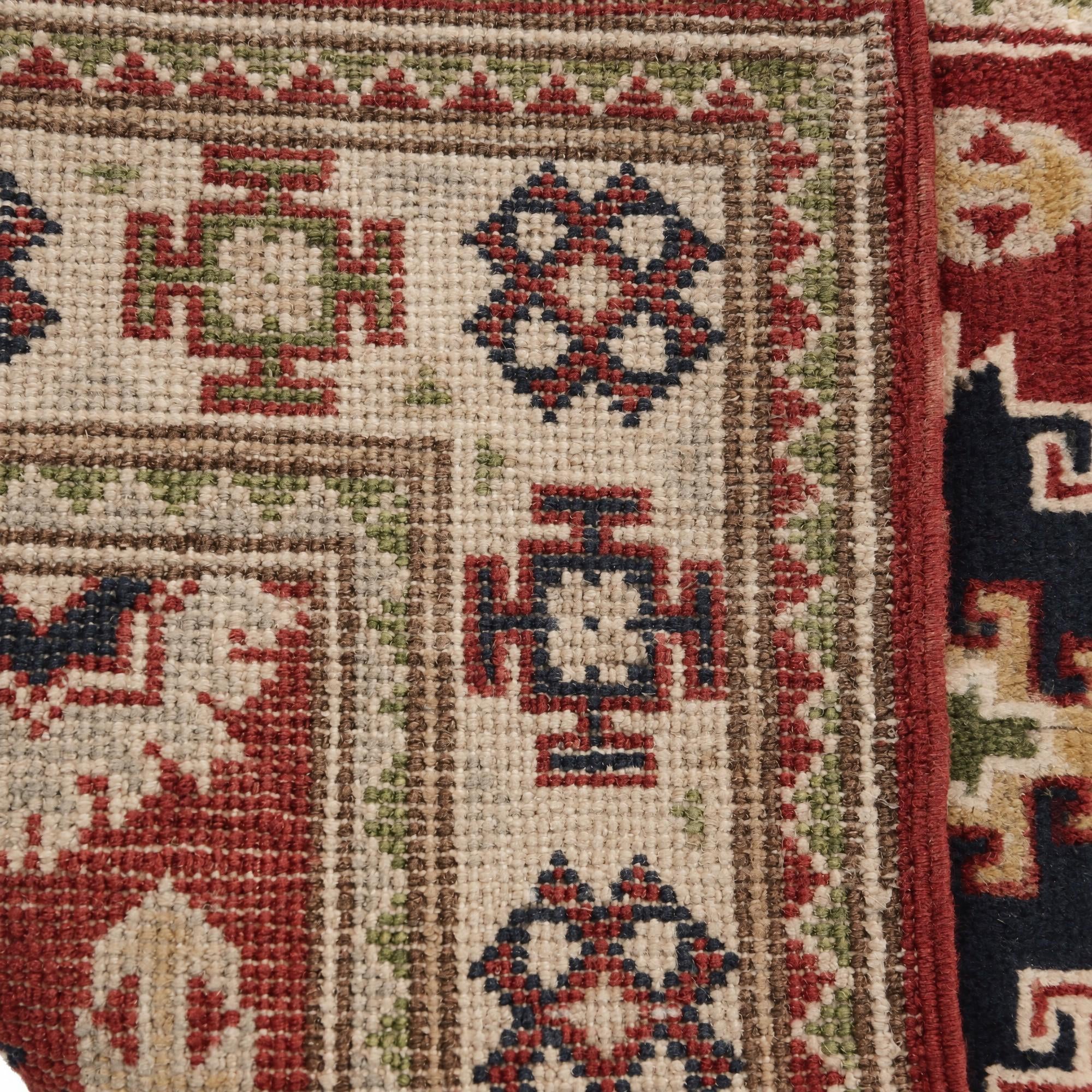 55cm x 90cm Hand Knotted Kazak Rug