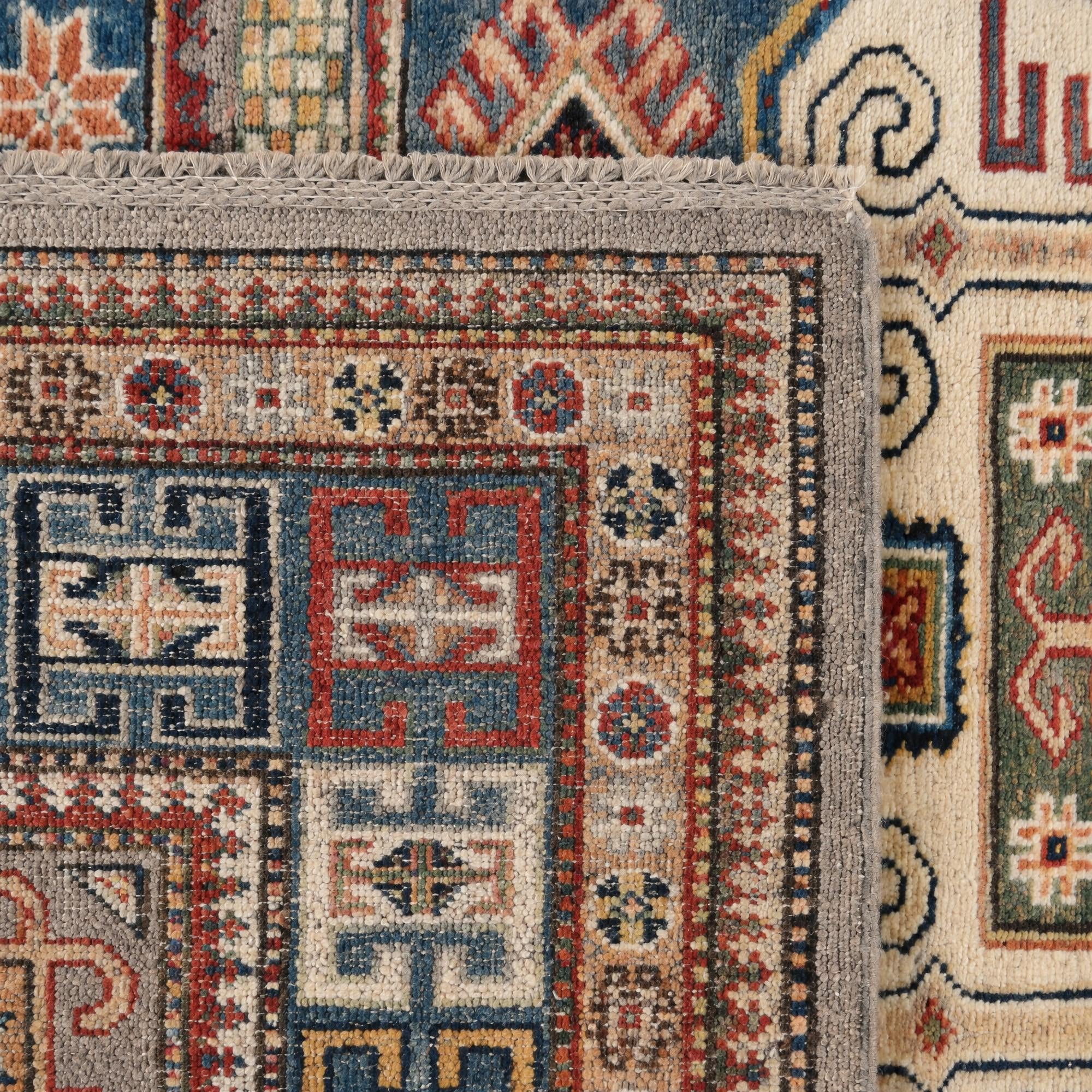 5' 1 x 6' 11 Hand Knotted Kazak Rug