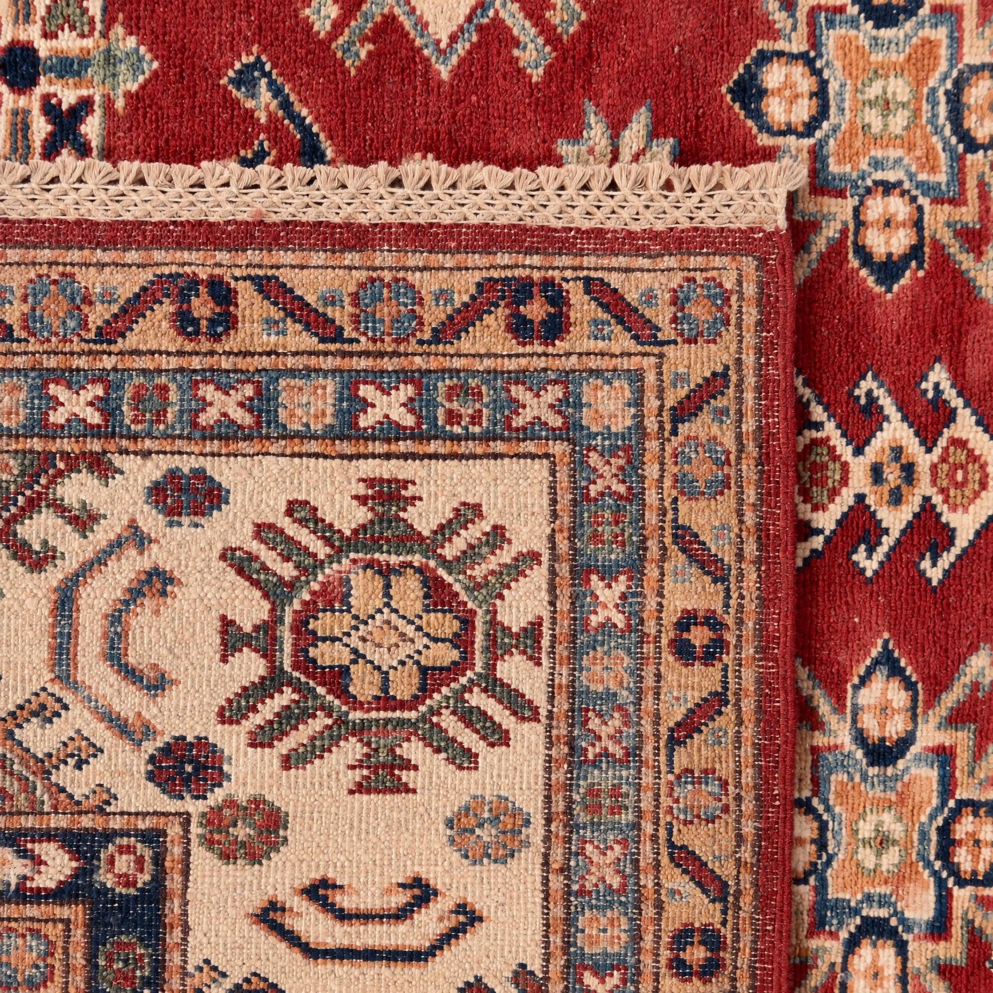 6' x 9' 1 Hand Knotted Kazak Rug
