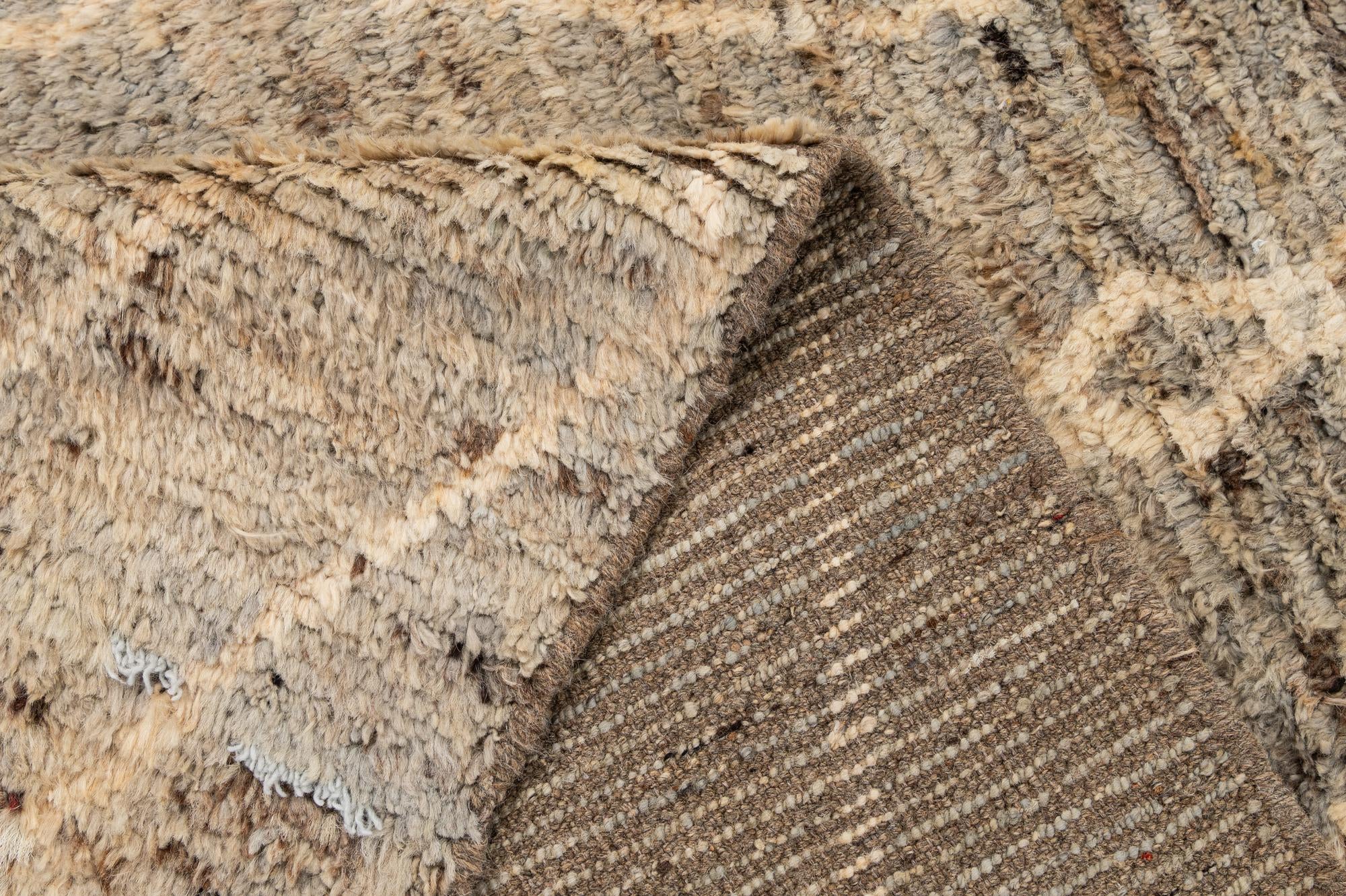 7' x 9' 6 Hand Knotted Moroccan Wool Rug