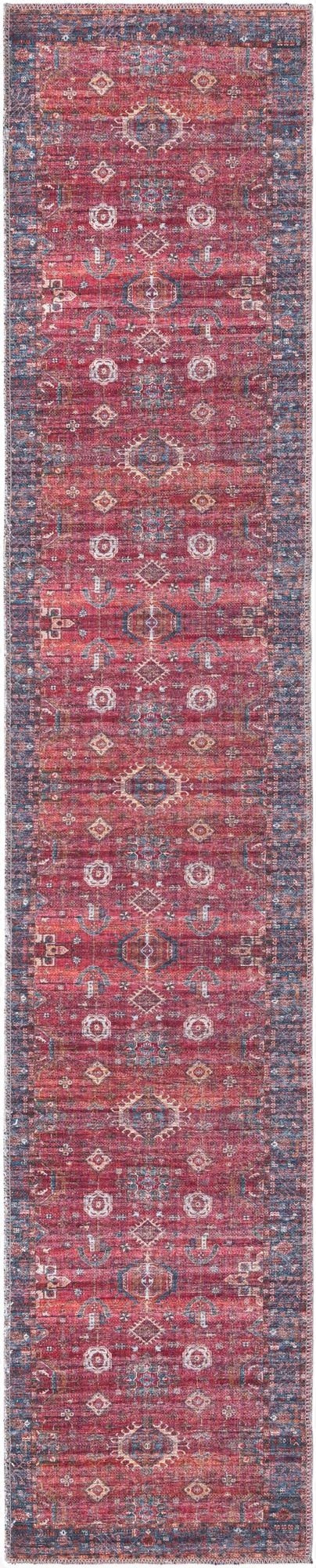A 10 ft runner rug in a traditional tribal pattern featuring distressed reds, blues, and cream, ideal for a hallway.