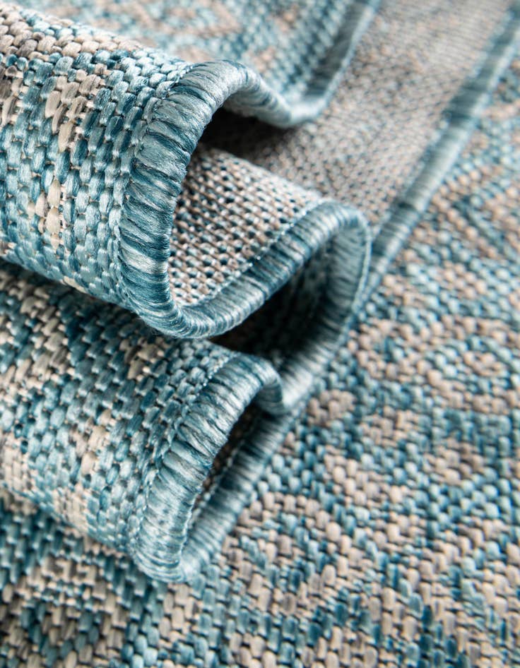 Detail image of 9' x 12' Easy-Clean Border Indoor / Outdoor Rug