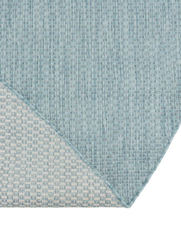 Detail image of 7' 10 x 10' Easy-Clean Solid Indoor / Outdoor Oval Rug