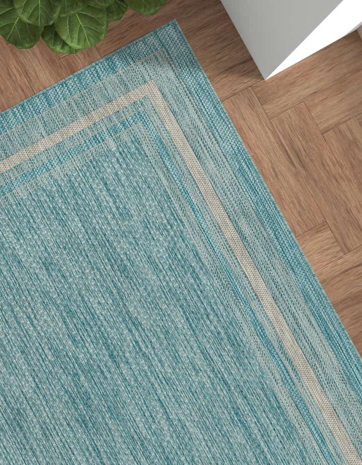 5' 3 x 8' Easy-Clean Border Indoor / Outdoor Rug