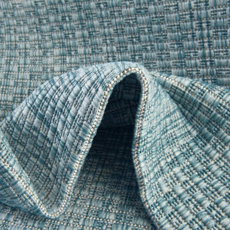 Detail image of 7' 10 x 10' Easy-Clean Solid Indoor / Outdoor Rug