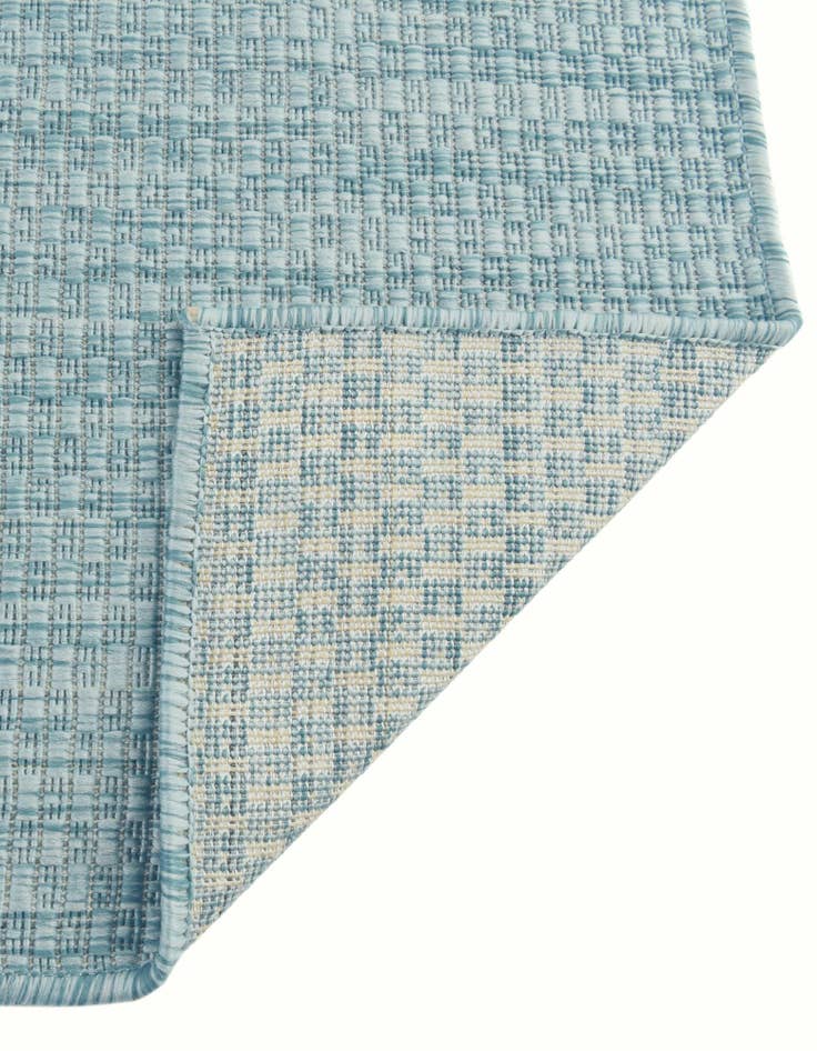 Detail image of 7' 10 x 10' Easy-Clean Solid Indoor / Outdoor Rug