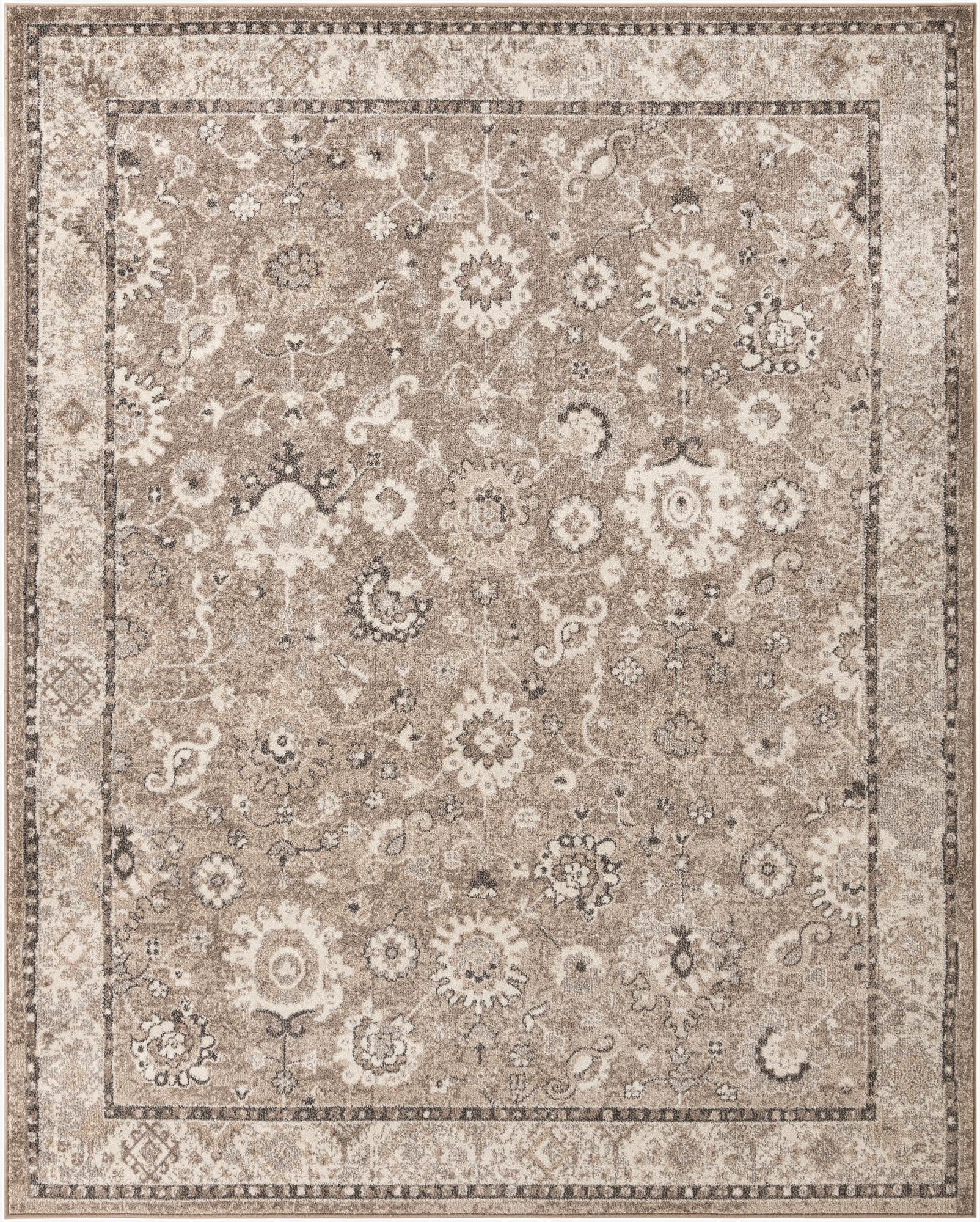 An 8x10 rectangular Madeline rug featuring a traditional botanical pattern in shades of blue, brown, ivory, and gold.