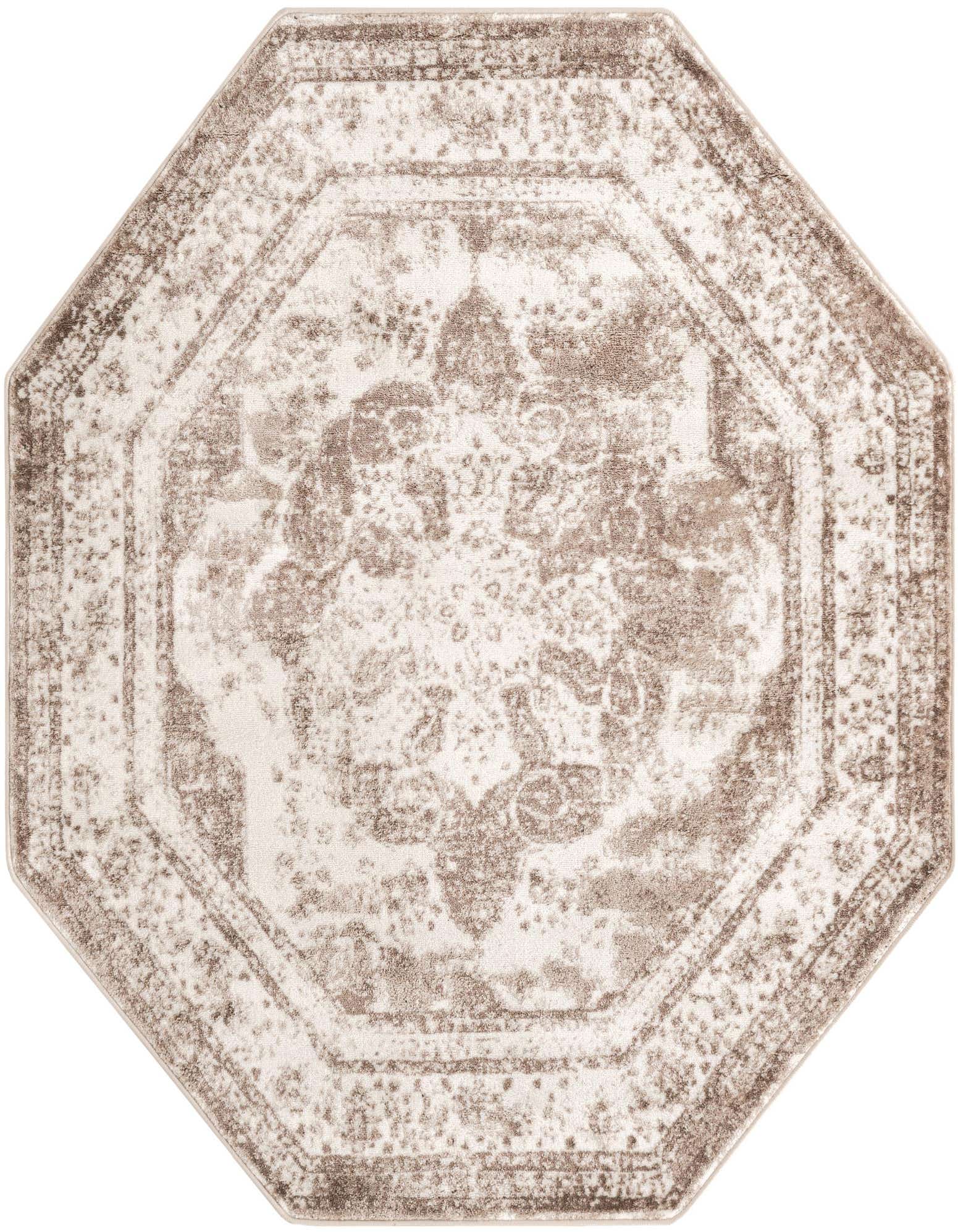 An octagon-shaped Monte Carlo rug in brown and ivory, featuring a distressed medallion and border pattern.
