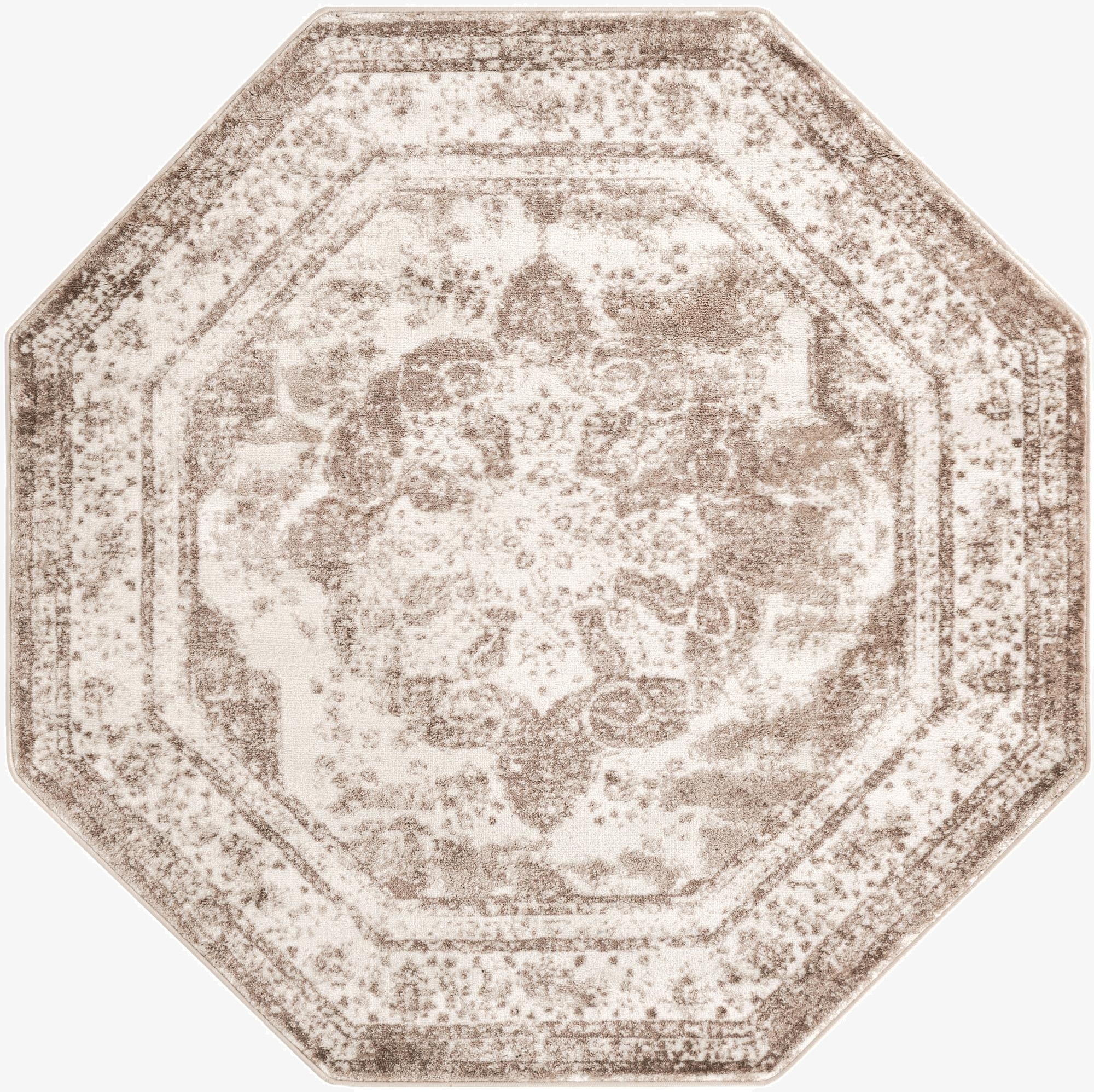 An octagon-shaped Monte Carlo rug in brown and ivory, featuring a distressed medallion and border pattern.