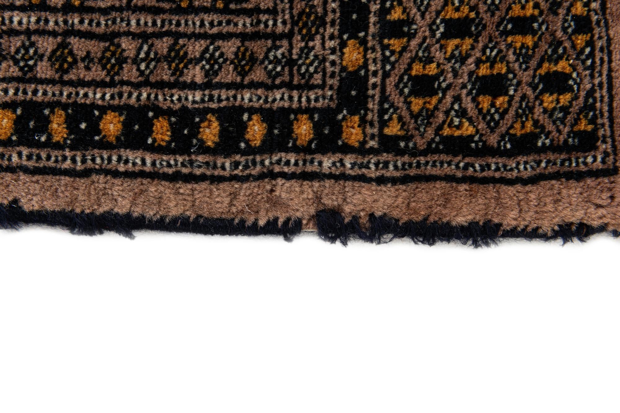 3' 1 x 5' 7 Hand Knotted Bokhara Wool Rug