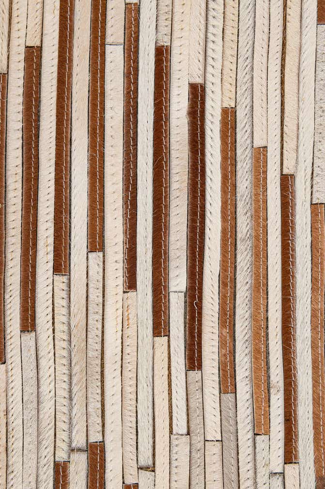 4' 11 x 8' 2 Cowhide - Patchwork Rug
