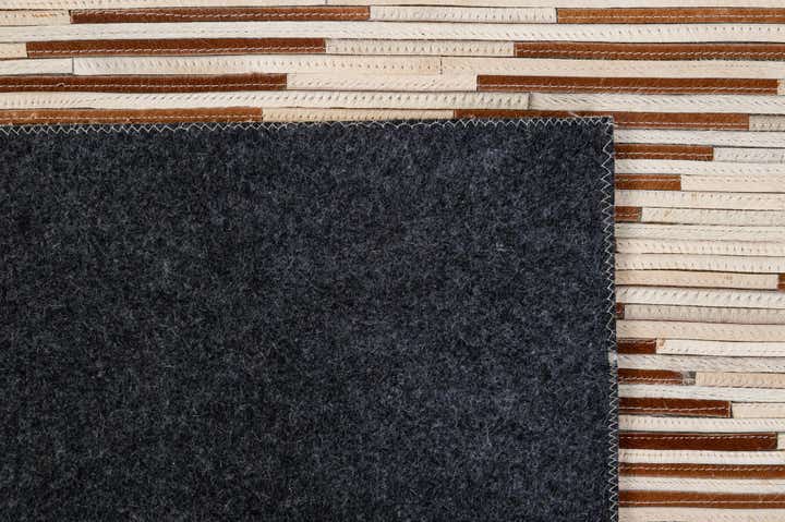 4' 11 x 8' 2 Cowhide - Patchwork Rug