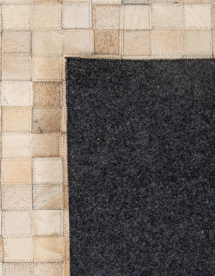 Detail image of 5' 1 x 8' Cowhide - Patchwork Rug