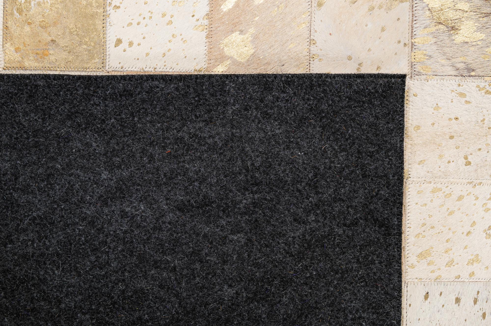 4' 11 x 7' 11 Cowhide - Patchwork Rug