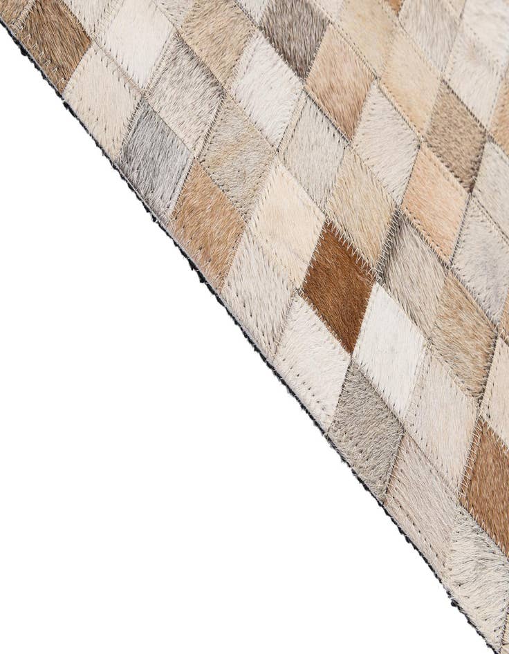 Detail image of 4' 11 x 8' 1 Cowhide - Patchwork Rug