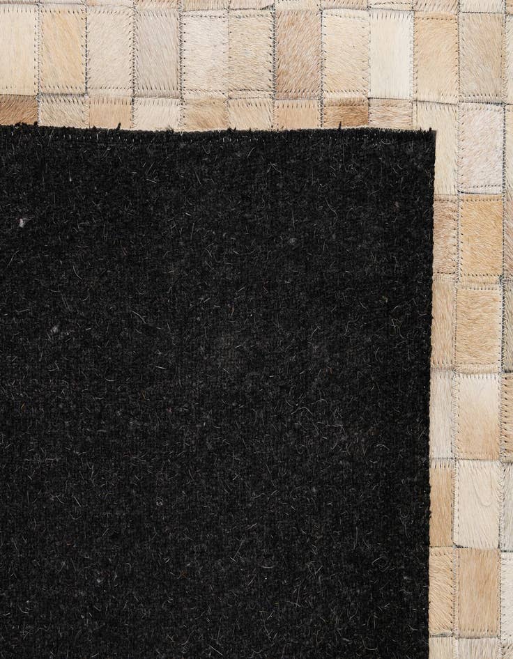 Detail image of 5' 2 x 8' 2 Cowhide - Patchwork Rug