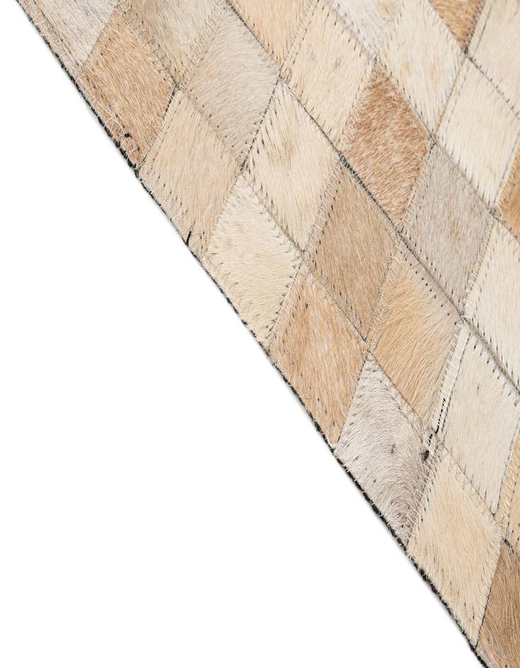 Detail image of 5' 1 x 7' 10 Cowhide - Patchwork Rug