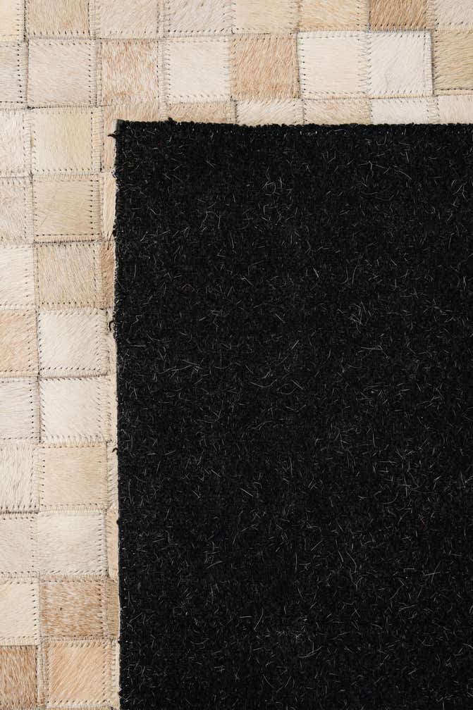 5' 1 x 7' 10 Cowhide - Patchwork Rug