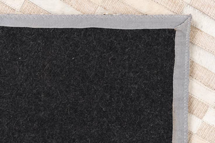 Detail image of 3' 10 x 5' 10 Cowhide Leather Rug