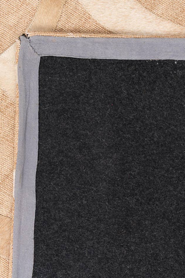 Detail image of 4' 1 x 6' Cowhide Leather Rug