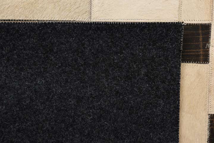 5' 3 x 8' Cowhide Rug