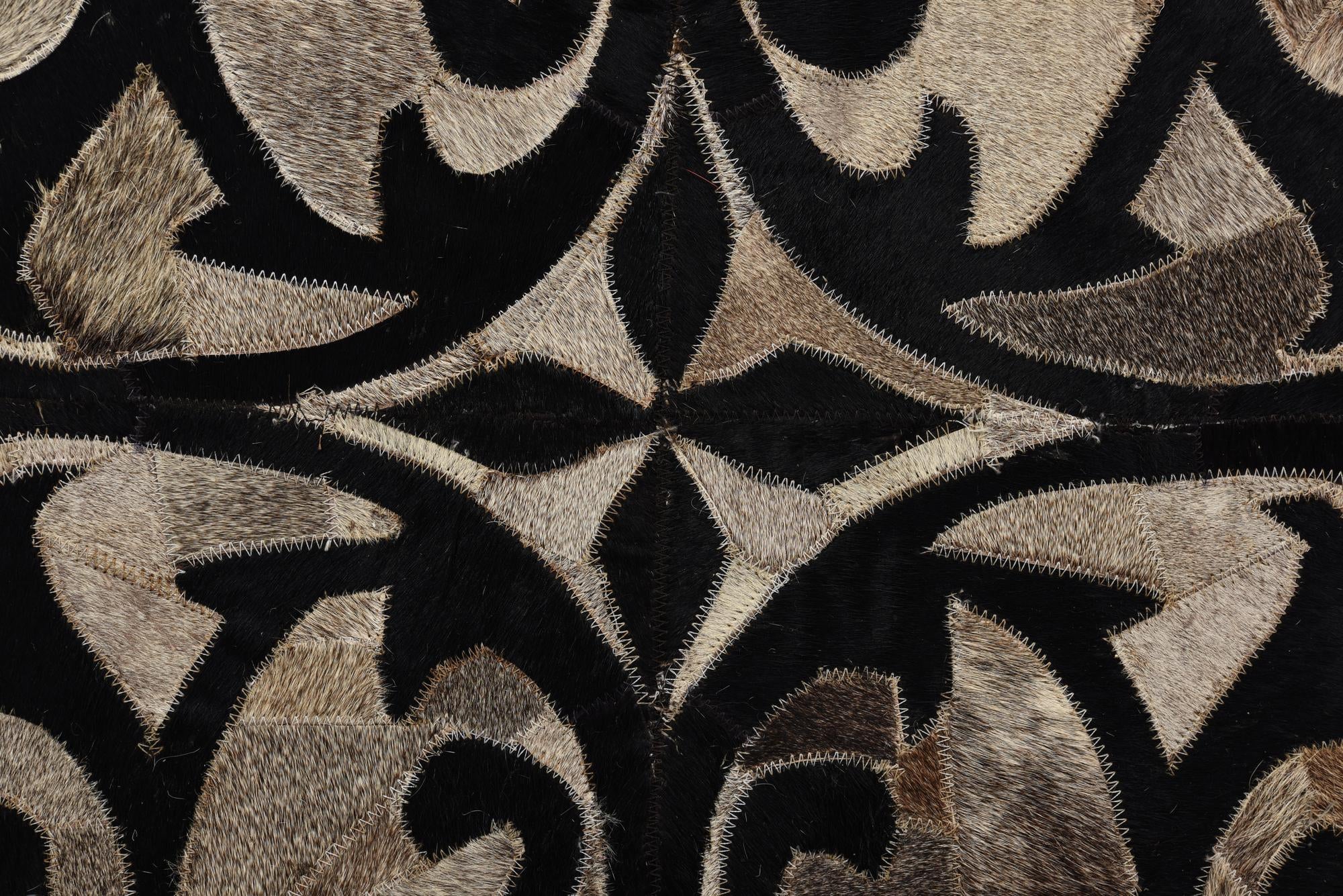 4' 10 x 7' 5 Cowhide Rug