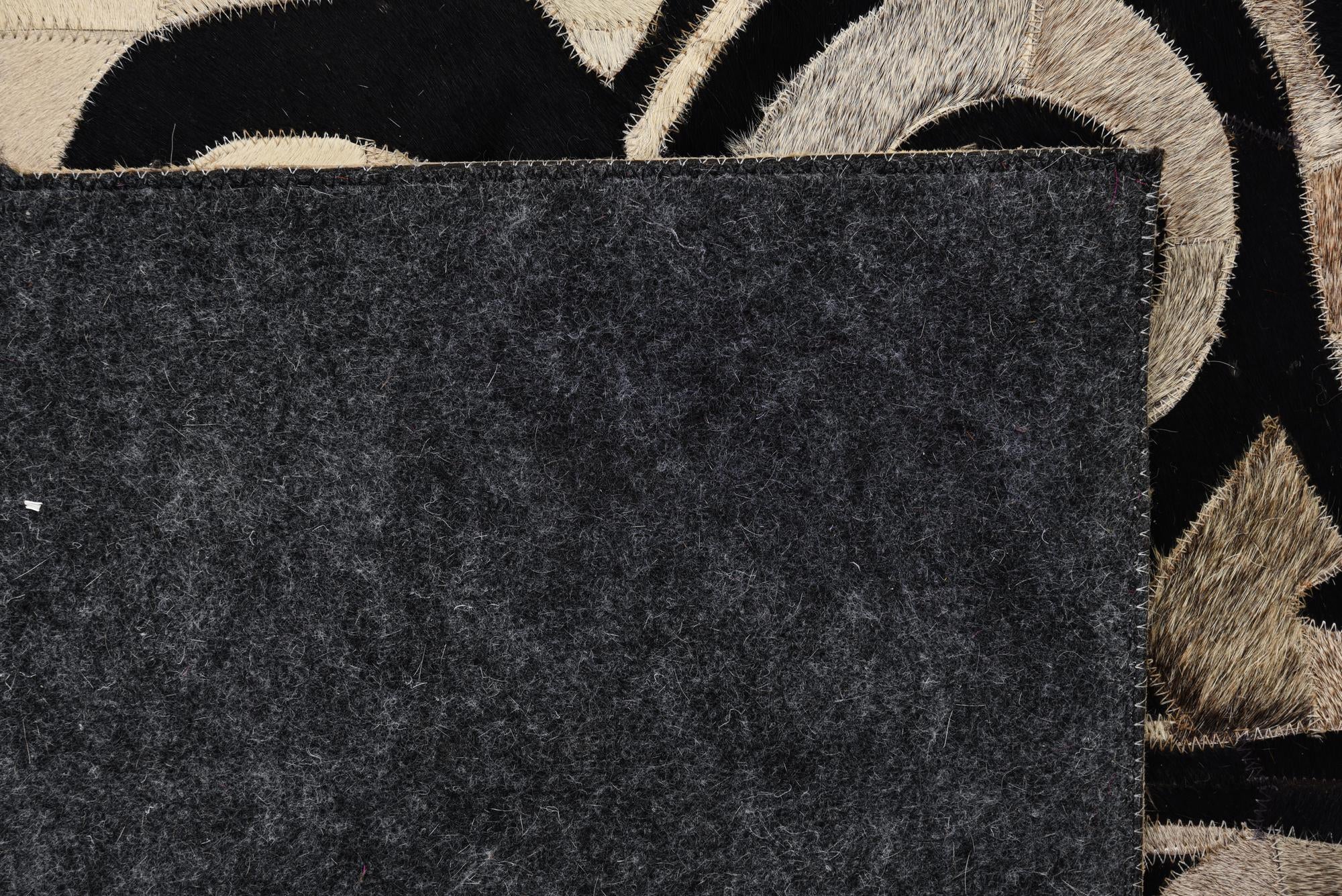 4' 10 x 7' 5 Cowhide Rug