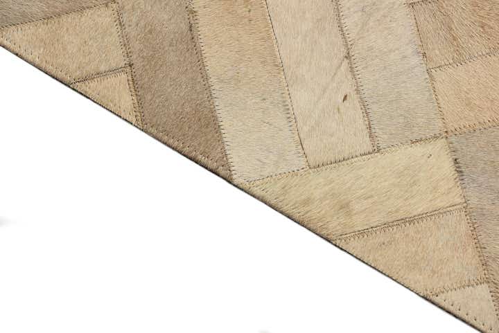 2' 1 x 3' Cowhide Rug