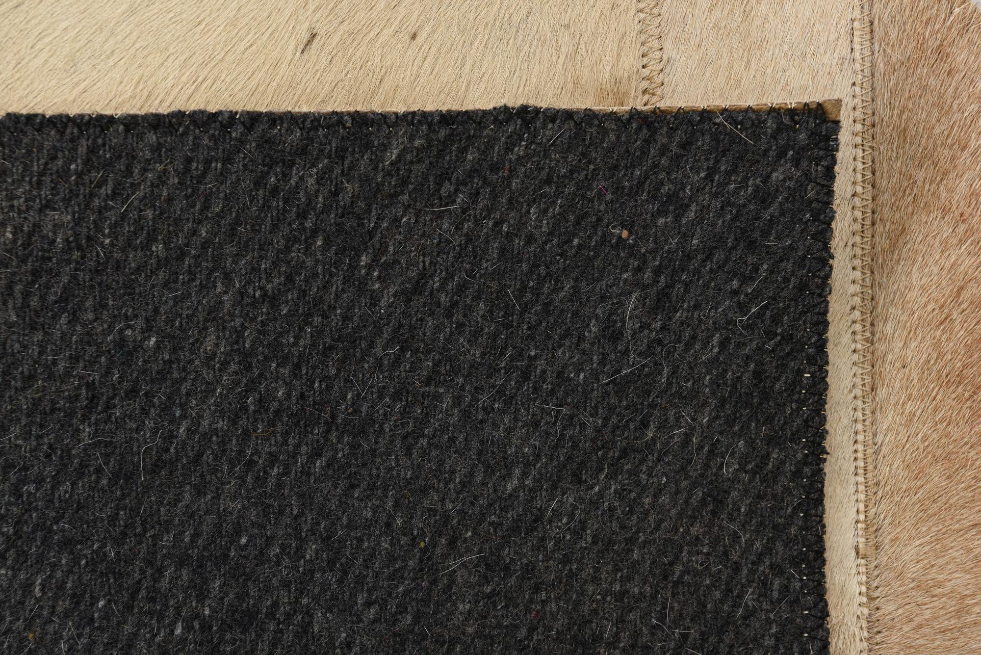 2' 1 x 3' Cowhide Rug