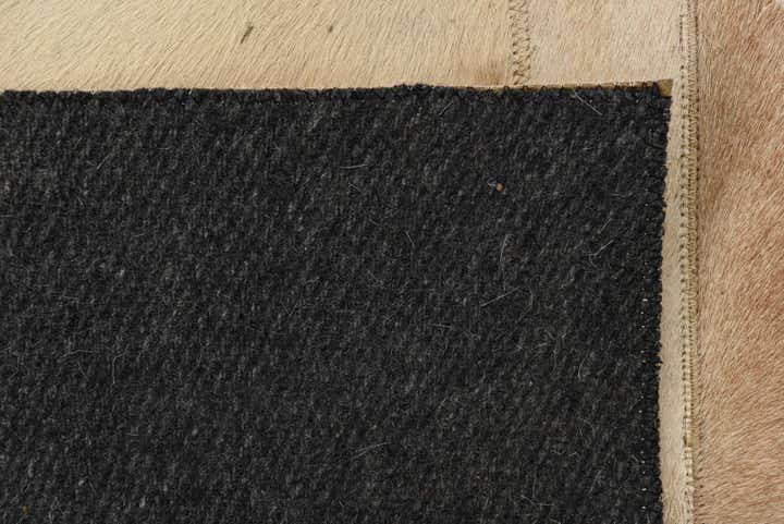 2' 1 x 3' Cowhide Rug