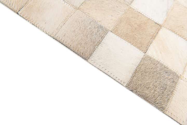 4' 11 x 7' 10 Cowhide Stocks Rug