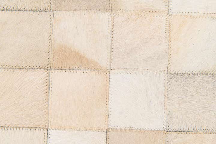 4' 11 x 7' 10 Cowhide Stocks Rug