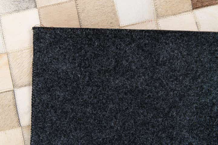 4' 11 x 7' 10 Cowhide Stocks Rug