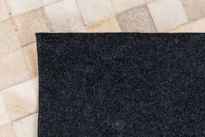 4' 11 x 7' 10 Cowhide Stocks Rug