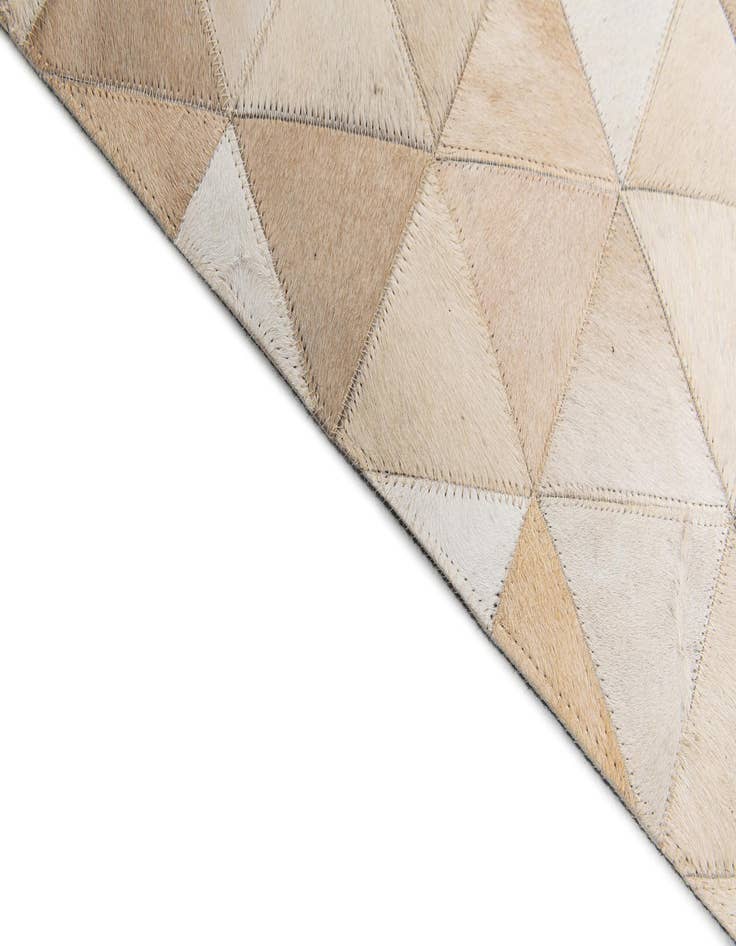 Detail image of 5' 2 x 8' 1 Cowhide Stocks Rug