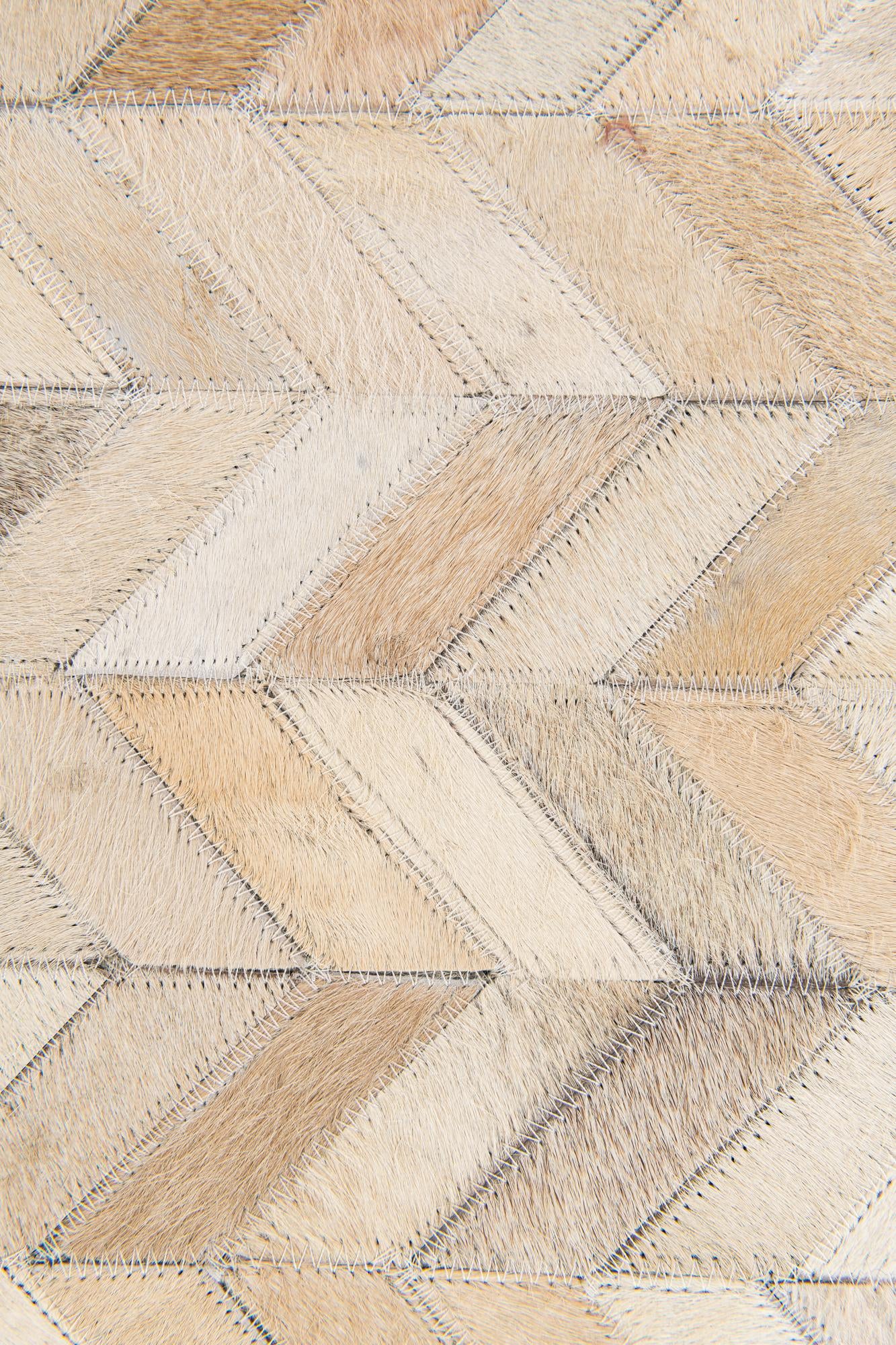 5' 1 x 7' 10 Cowhide Stocks Rug