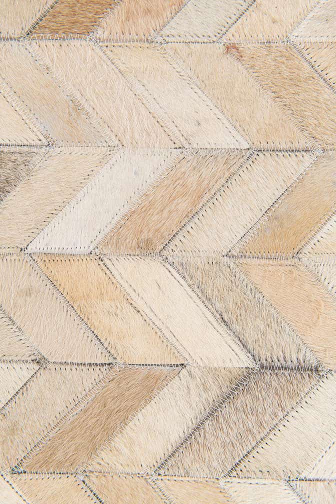 5' 1 x 7' 10 Cowhide Stocks Rug