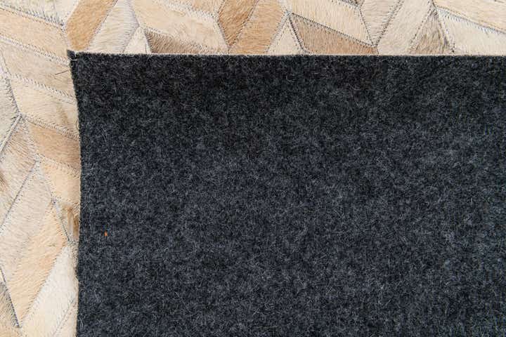 5' 1 x 7' 10 Cowhide Stocks Rug