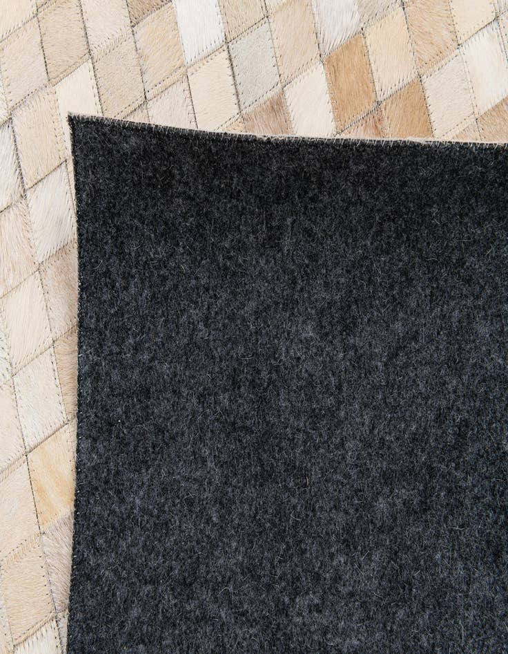 Detail image of 5' 1 x 7' 11 Cowhide Stocks Rug