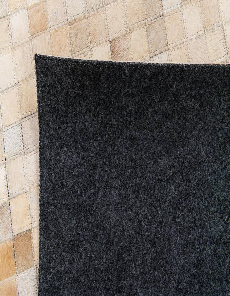 Detail image of 5' 2 x 7' 11 Cowhide Stocks Rug