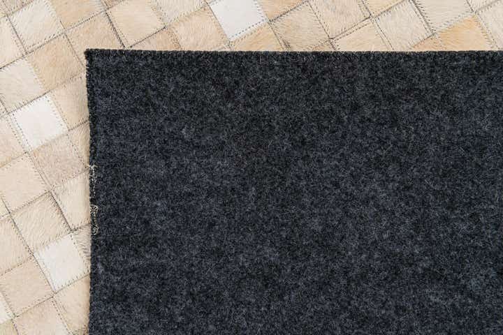 5' 2 x 7' 11 Cowhide Stocks Rug